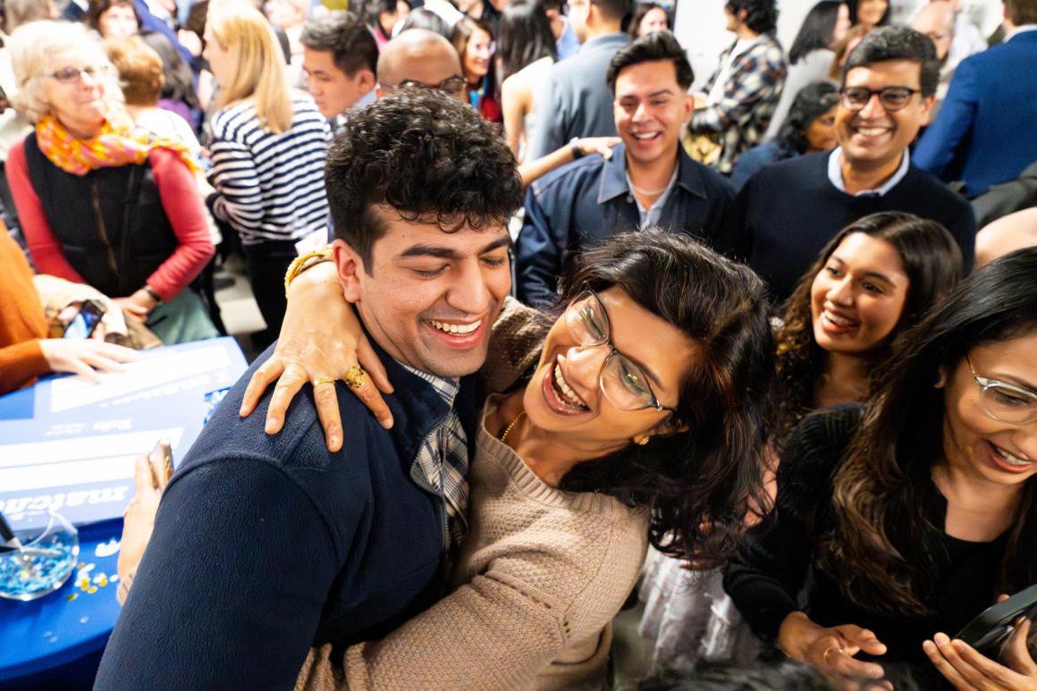 03/20/2026 - Boston, Mass. - Aneesh Bahadur, M26, reacts to news of their residency placement with family and friends during Match Day at the Tufts University School of Medicine on March 20, 2026. Aneesh will spend a year at MetroWest Medical Center - in Framingham, MA before going on to University of Colorado School of Medicine, Denver for a residency in Diagnostic Radiology. (Alonso Nichols/Tufts University)