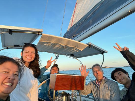 Students on a boat with Andrew Bohm