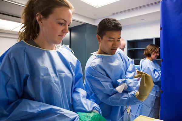 Students during clinical rotation wearing protective wear