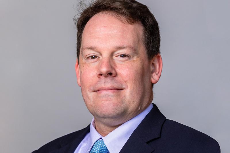 Headshot image of James