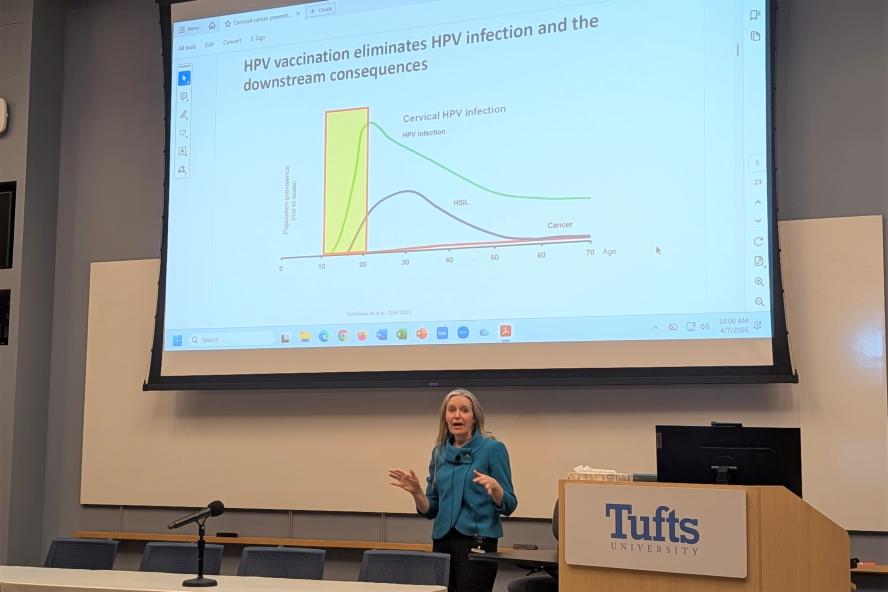 Rebecca Perkins giving a presentation at the 2026 Converging on Cancer Symposium