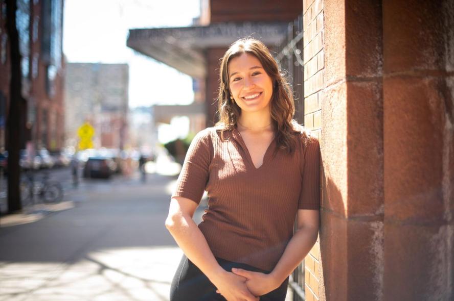Carly Amon, M23, poses for a portrait