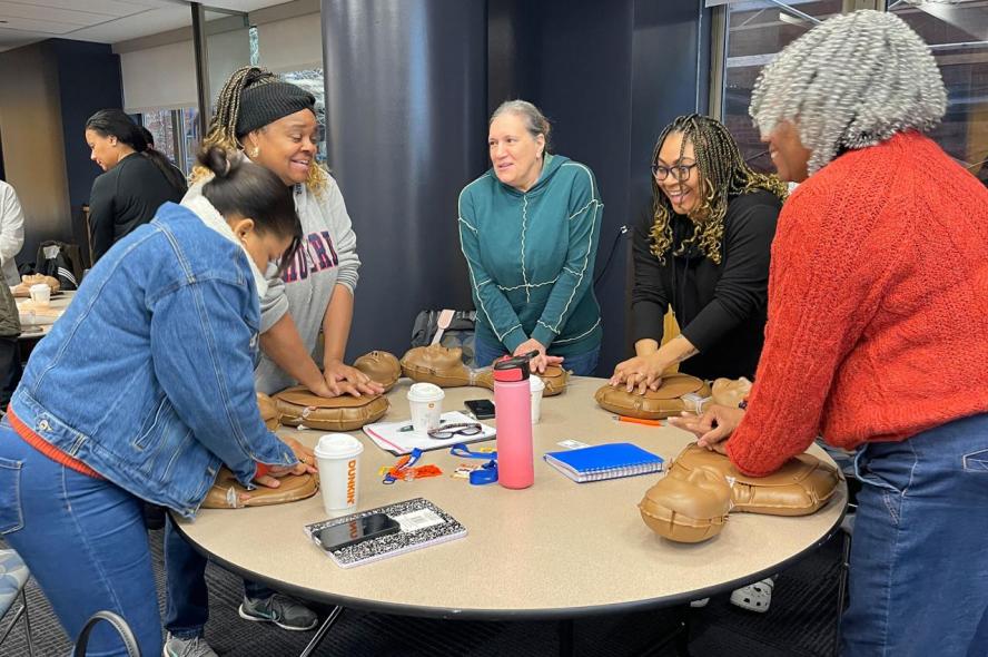 COHERE program participants train to become community health workers.