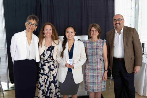 Left to Right: Dayna Cunningham, Pierre and Pamela Omidyar Dean of Tisch College; Jennifer Greer-Morrissey, program manager of civic life for health sciences; Melissa Calica, 25; Amy Kuhlik, dean for student affairs at TUSM; and President Sunil Kumar