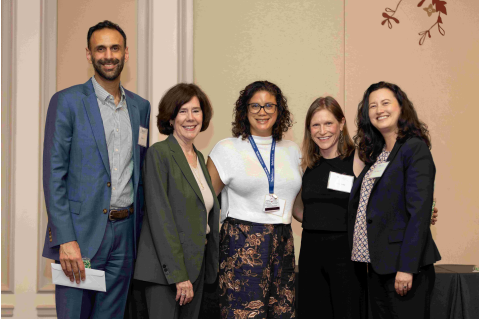 Five faculty members posing for a picture
