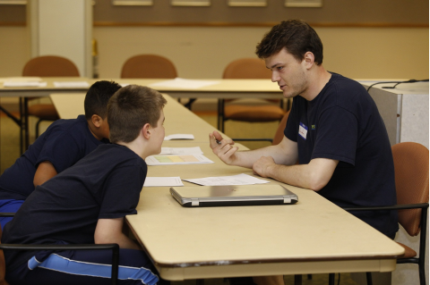 An MD student tutoring two kids