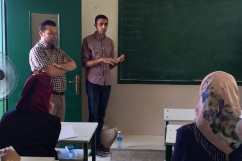 Students giving a presentation in a classroom