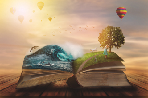 Open book with ocean scene on left page, grassy scene on right page, and hot air balloons above