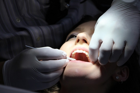 Dental exam being performed