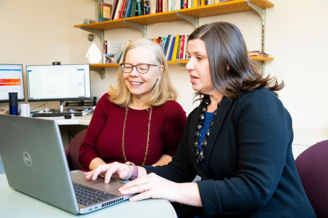 Chloe Bird, director of CHER, and Amy LeClair (right), assistant professor at the School of Medicine and Graduate School of Biomedical Sciences