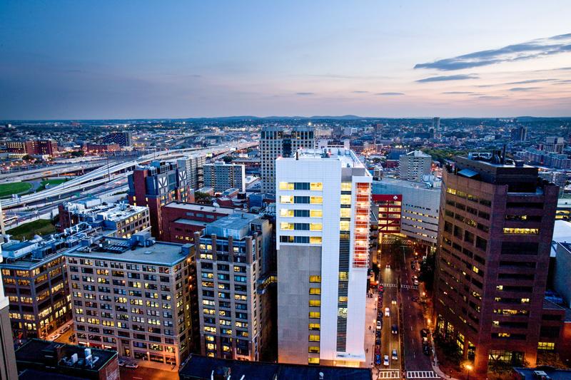 View of Boston skyline and Greater Boston Area at night