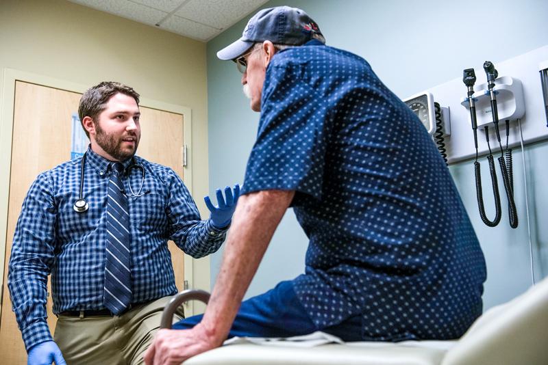 PA student during a clinical rotation talking to patient